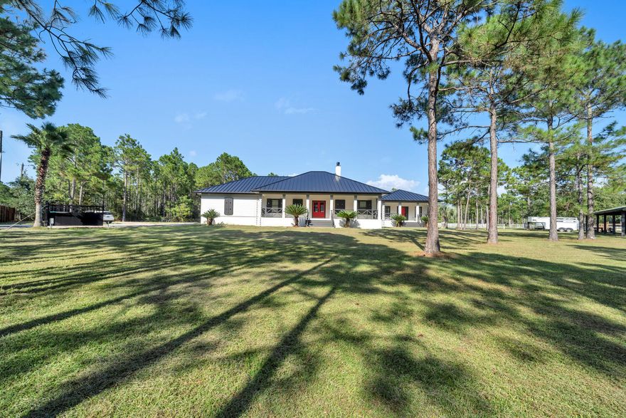 OMG! Nothing like this on the market.  Cutest farmhouse this side of the Bay.  Home taken down to the studs and new design will impress even the pickiest buyer.  Tucked privately behind a Grand oversized Farmstyle fence for added privacy and security.  The metal gate opens up and welcomes you to your equestrian property quaintly positioned between the Bay and the Beach.  Hard to have the best of both worlds.  Then when  guests desire to visit, and they will, they will have their own private guest quarters, complete with kitchenette, full bathroom, separate bedroom/living and dining space.  Oversized massive pine trees/magnolia trees add so much shade and coverage to the property.  You will truly get lost in the stillness of the trees with birds chirping and deer playing... Farm is complete with several paddock spaces, barn, oversized separate garage that will hold 4 large RV's, with a large office and half bathroom in the garage...Home has 3 oversized garage bays attached.  Large basketball court.  Oversized Chicken coop with fresh producing eggs daily...Dog run...Large grass arena with sand base for softer landings for those Equestrian Jumpers.  Farm equipment and other items may stay for a negotiated price.  Barn complete with tack room, feed room and 3 stables. Well water for the farm property, Home is on county water. 