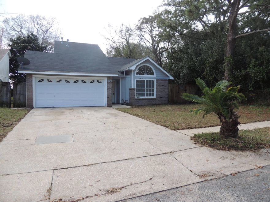 Great home located in the heart of town. Close to schools, shopping, military bases and the beautiful white sand beaches.Great investment opportunity or you can make it your own. Property is being sold AS IS.