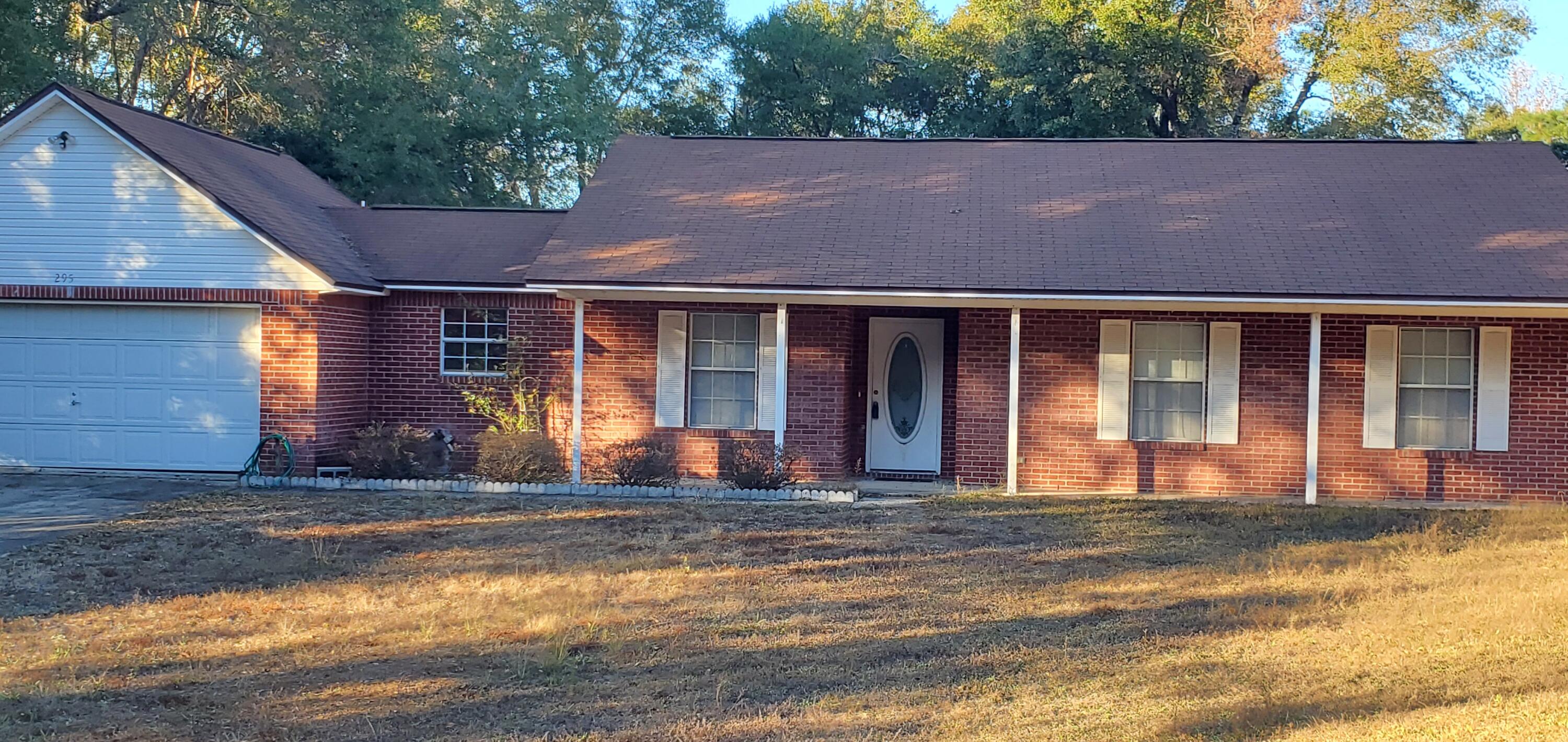 One owner all brick home with 3 bedrooms, 2 baths near Bob Sikes Elementary School and convenient to downtown and shopping.  Nice size living room is complimented with a brick, wood burning fireplace.  Bay window area in the eat-in kitchen.  Bay window with window seat in the good size master bedroom.   Nice size lot at .49 acreage, a 2 car garage and drive way with plenty of room for more parking.  New HVAC was installed in 2022.  Home is  ready for new buyer to call it home!