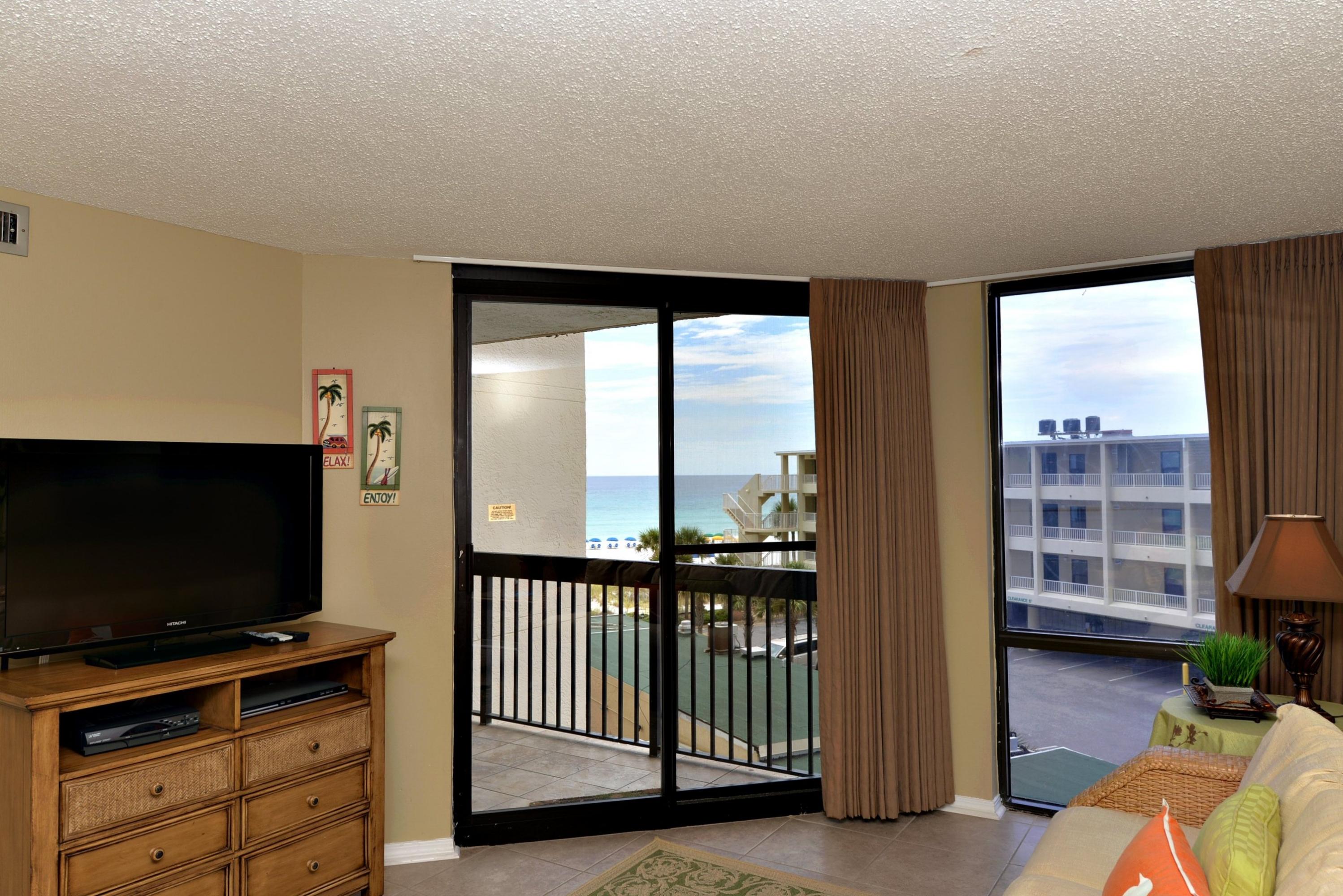 HELLO SUNSHINE!! OVER $24,000 ANNUAL RENT on this beachside cutie completely remodeled in fun coastal colors. Granite counter tops in the kitchen & bathroom vanities, tile throughout including the bedroom, & custom draperies & linens help make this condo one you want to call your own. Each piece of furniture & each accessory was carefully chosen to project a cheerful atmosphere that will make you smile! The bathroom has two vanity areas to help accommodate guests. There is a nice view of the gulf from the balcony & the living room. Other features include: flat screen TVs, new tub, & new faucets. This one is a must to see & have for your own. Sundestin is a choice vacation rental complex with many amenities including an indoor & outdoor pool as well as hot tubs, a kiddie splash
