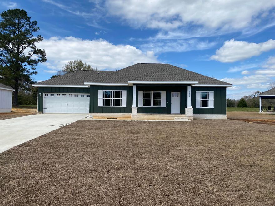 Beautiful new construction home with upgrades! No carpet- all LVP flooring. Custom grey stained cabinetry throughout. Granite countertops in kitchen and bath. Tiled shower in master bathroom. Upgraded trim package throughout. Large back porch and good lot size for extra projects! Completion date 3/30. Appliances are now in and I will update photos weekly.