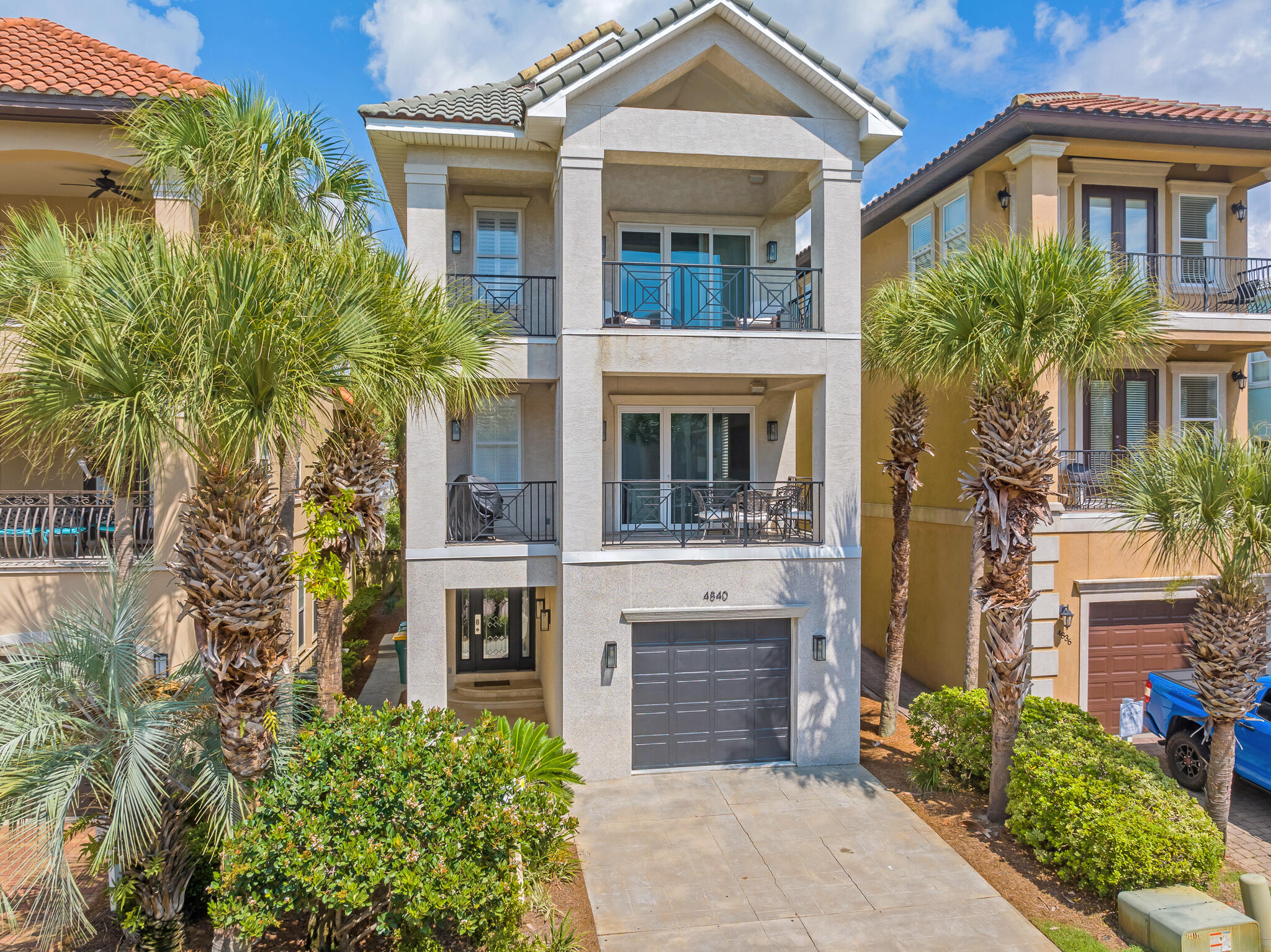 Welcome to 4840 Ocean Blvd, an updated fully furnished, & luxurious 4 bed, 5 bath home situated in the gated community of Destiny by the Sea. New interior & exterior lighting and a new black metal roof to be installed in October! The home greets you by an open & inviting living area featuring soaring ceilings, travertine flooring, and floor-to-ceiling windows providing loads of natural light. The open kitchen is a chef's dream with granite countertops, stainless steel appliances, & ample cabinet space. The master suite is a true oasis, with a private balcony and a spa-like master bathroom complete with a soaking tub and walk-in shower. Three additional bedrooms each offer their own private en-suite bathrooms. The community offers a community pool, fitness center, & private beach access.