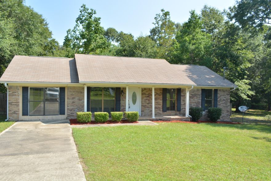 REO. All brick home located on a large lot with a privacy fenced backyard with mature trees. This home has an open floor plan with a large kitchen that is tiled, has ample wood cabinets and a pantry. The kitchen is open to the breakfast room with sliding glass doors which lead to a deck out back. The enclosed garage could be a 4th bedroom or family room. A very large laundry room is located off the bonus room. Walk-in closets in 2 bedrooms. Please call for more information.