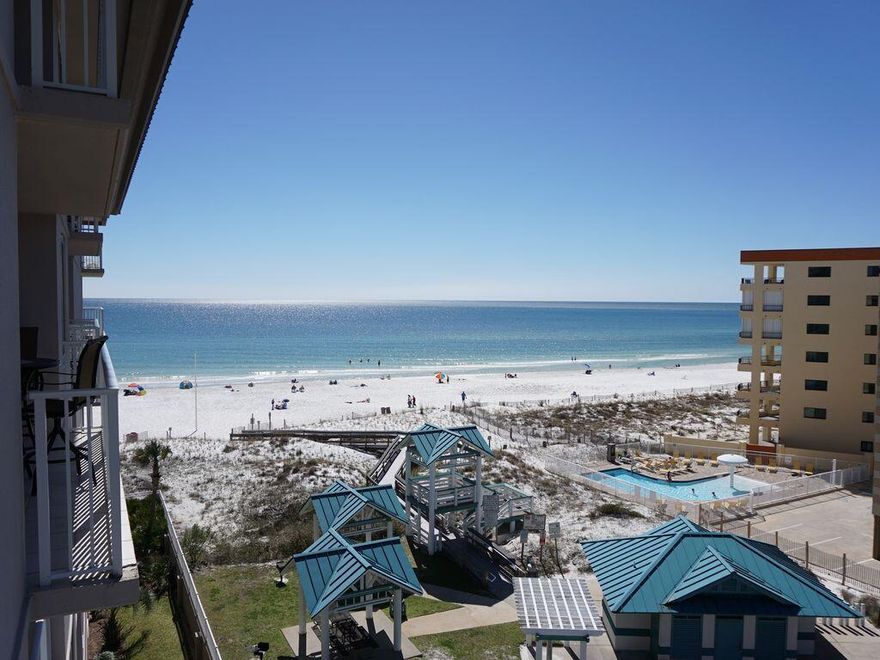 A low-density luxurious Gulf front condominium on Okaloosa Island with just seven stories. This beautiful 1-bedroom, 1-1/2 bath condo is being sold fully furnished and decorated including the flat screen TVs. The flooring was recently updated to a contemporary tile. Light coastal color palette make this unit very inviting. This unit is currently an income producing unit that sleeps 6 with the sleeper sofa, king bed and hallway bunks. The interior features an open floor plan, raised ceilings and access to a private balcony from the living area. Enjoy beautiful Gulf views from the interior & balcony and even capture views of Santa Rosa Sound. The unit faces west so sunsets are spectacular! New HVAC and stainless kitchen appliances in 2019.