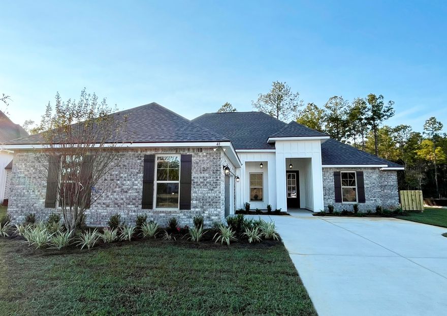 Awesome builder rate + choose TWO free: front gutters, refrigerator, smart home package, or window blinds. Restrictions apply.The KLEIN III H in Starburst at Hammock Bay community offers a 4BR, 3BA, open design. Upgrades added (list attached).  Features: double vanity, garden tub, separate custom tiled shower, and walk-in closet in master suite, tray ceiling in master bedroom, kitchen island, walk-in pantry, boot bench in mudroom, covered front and rear porch, crown molding, recessed lighting, smart connect Wi-Fi thermostat, smoke/carbon monoxide detectors, landscaping package, architectural 30-year shingles, flood lights, and more!Energy Efficient Features: water heater, kitchen appliance package with electric range, vinyl low E windows, and more! Energy Star Partner.