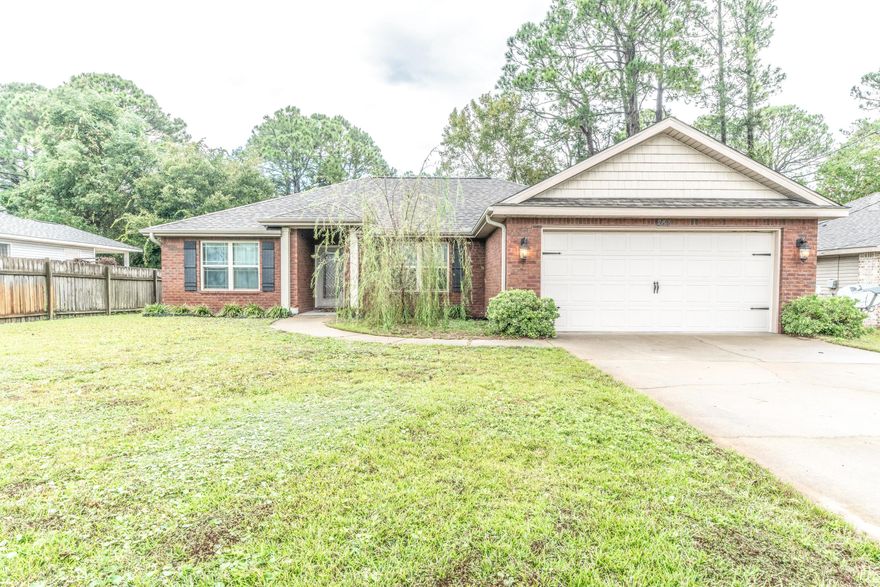 Home for the holidays? This fabulous 1,650 square foot, 4 bedroom, 2 bath home ideally situated within a 10 minute commute to Hurlburt Field and centrally located to Navarre Beach boasts stunning features of: Granite countertops, stainless steel appliances, tray ceilings with crown molding in the master bedroom and much more! Open Split bedroom floor plan, cultured marble vanities, large porcelain tile, designer cabinetry, open breakfast bar, and an oversized pantry could be yours. Call today for your private tour.