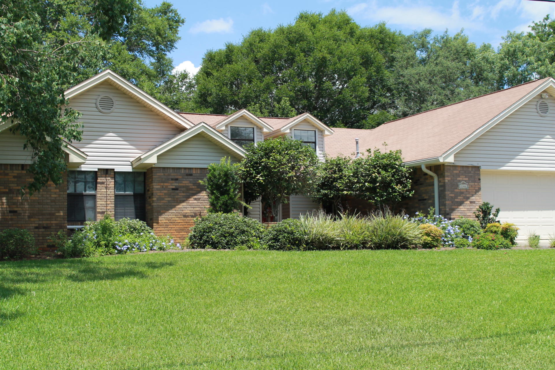 This lovely, well maintained home, is only 5 minutes to the back entrance to Hurlburt(Freedom Way). The home has been updated throughout the years by the original homeowner. Seller recently replaced HWH(2016),garbage disposal, heating/cooling system in 2012 w/10 year parts & labor extended warranty, as per Mills H/AC), added storm panels w/separate storage area, and, had both front and back ward redesigned and landscaped in 2012. This renovation was over $14,000.00. Landscape lighting(solar)replaced in 2016 in the front courtyard One of the most enjoyable additions is, the large screened porch(13x12.5)w/ outdoor carpet. The porch overlooks the lush backyard landscaping. The front door has a retractable screen recently added. The kitchen is well designed with a movab