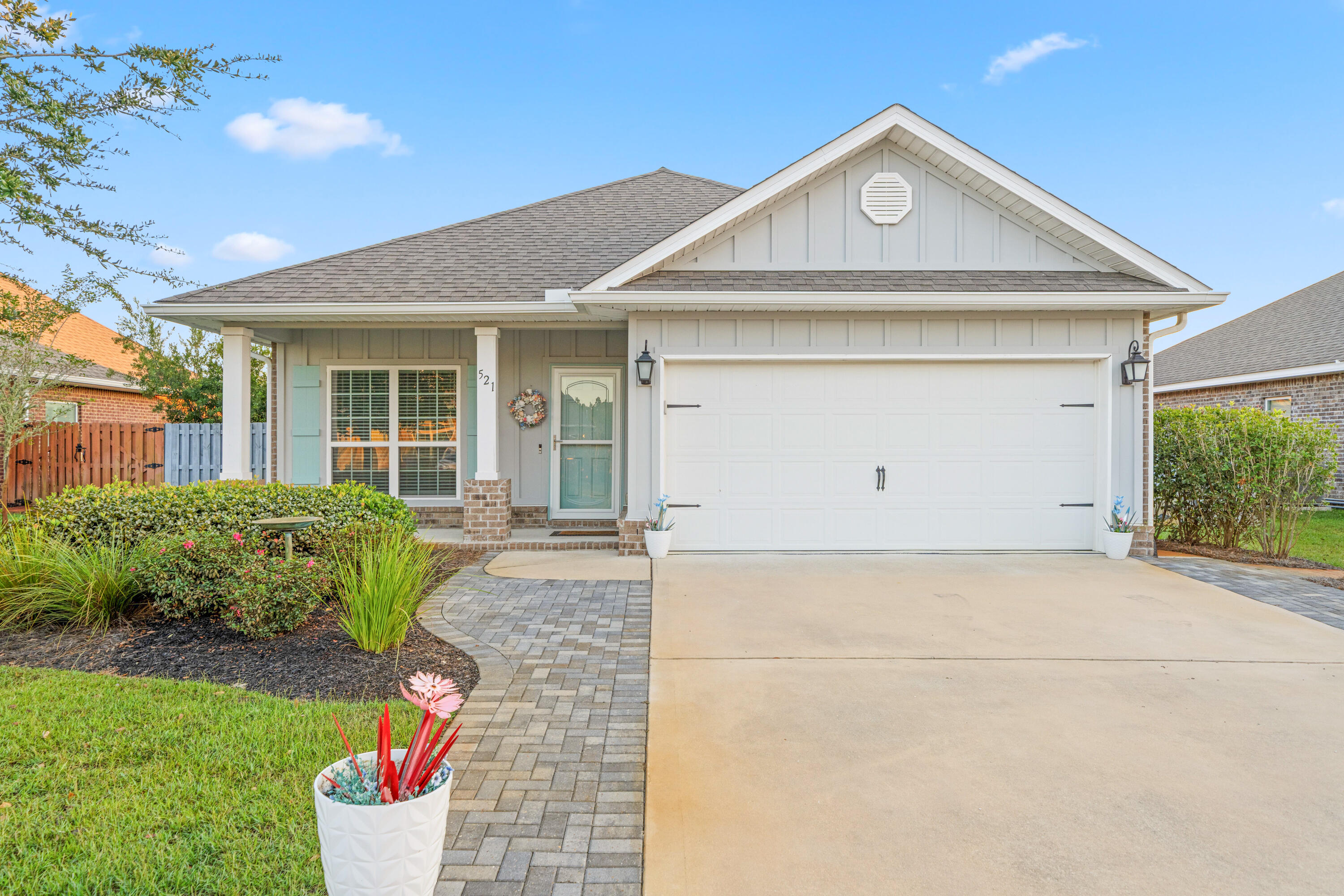 Welcome to this immaculate three bedroom two bath home in the coveted master-planned community of Hammock Bay. Looking for a pet-friendly neighborhood with large sidewalks, two zero-entry swimming pools, large workout gym, pickle-ball courts, kid-approved playground, general store, brewery, food trucks and even a new dental office that you can walk to? You've found it! This open concept floor plan with new skylights, new storm door, new screened in porch, new master bathroom shower, and new guest bedroom ceiling fans, offers natural light to welcome you home. The well-groomed backyard provides a quiet place for you to enjoy all that Florida offers. Schedule a viewing today for this turn-key, move-in ready home!