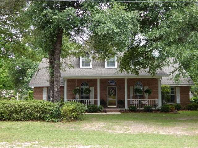 Here's your chance to actually own this sought after home in a premier location on the south end of Crestview with an easy commute to the military bases and the white sands of the Emerald coast. This is a ''one owner'' home and was custom built with high quality touches throughout. The kitchen offers tiled floors, tiled back splash, solid surface counter tops, new appliances within the last year, solid, oversized raised panel oak cabinets and open to the sunny breakfast nook and oversized laundry room. The laundry room has a pull down iron, deep work sink, exterior window and tiled floors. The house is dressed with real wood, plantation shutters throughout. The great room is comfortable and beautiful with 10 foot ceilings, brick gas fireplace, solid wood floors and a lot of natural light.