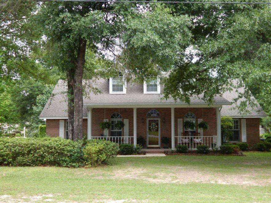 Here's your chance to actually own this sought after home in a premier location on the south end of Crestview with an easy commute to the military bases and the white sands of the Emerald coast. This is a ''one owner'' home and was custom built with high quality touches throughout. The kitchen offers tiled floors, tiled back splash, solid surface counter tops, new appliances within the last year, solid, oversized raised panel oak cabinets and open to the sunny breakfast nook and oversized laundry room. The laundry room has a pull down iron, deep work sink, exterior window and tiled floors. The house is dressed with real wood, plantation shutters throughout. The great room is comfortable and beautiful with 10 foot ceilings, brick gas fireplace, solid wood floors and a lot of natural light.