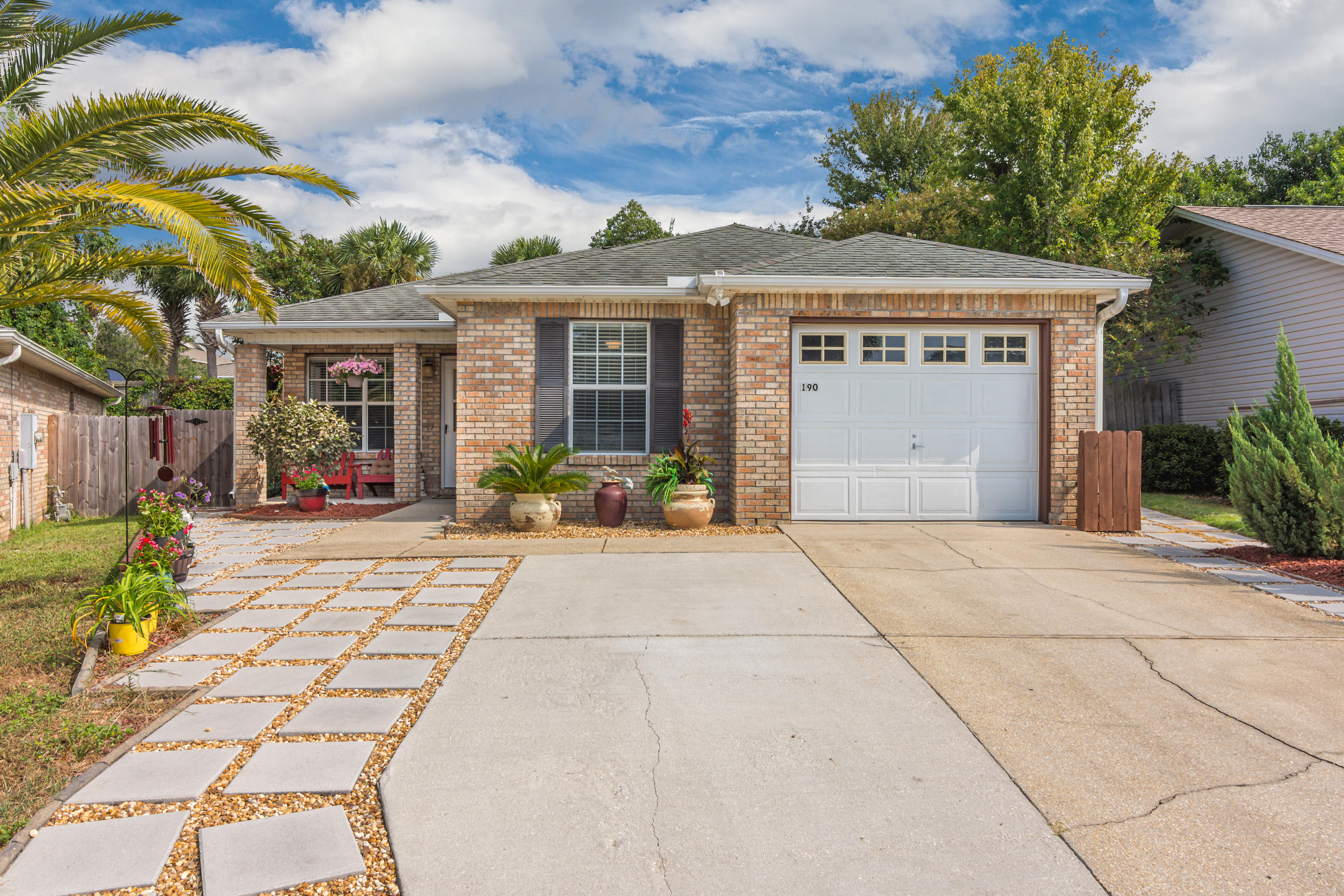 Location Location Location! Whether you're a first-time home buyer, retired, a ''snow-bird'' or an investor, what a great opportunity to live in the heart of Destin near the beautiful Emerald Coast Beaches, shopping, restaurants, nightlife, golf, boating and fishing. Everything you need is walking distance from this home. This property is well-maintained inside and out in pristine condition with extended driveway for guest parking and beautiful new landscaping. You'll love the coziness of the 2 bedroom/2 bathroom home. The living/dining/kitchen area give the home a ''spacious'' feeling. The kitchen has all stainless-steel appliances including a gas stove. Each bedroom has its own private bath. Some of the updates include: Fresh professional paint throughout entire home;