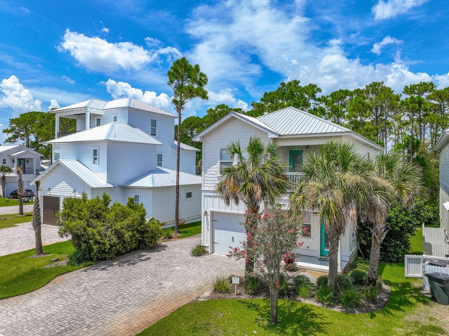 Qualified buyers can purchase for as low as 10% down! Ask How! Virtual Video Tour  available! Welcome to the Beach! This spacious and stunning beach house features both modern amenities and architectural character in a fantastic gated beach community w/ PRIVATE/DEEDED beach access. Sold Fully furnished, turn key ready and a rental machine. This home boasts an open living concept. The gorgeous oversized kitchen boasts stainless steel appliances, granite counter tops, large island, custom backsplash + more. 3 Bedroom w/ ensuites + custom built hallway Bunk area (Sleeps like a 4 bedroom house). The backyard showcases a covered porch, nature view, lots of room for family vacation activities and w/ room for a pool! Just steps away from the community pool and the World's most beautiful beaches! This is an amazing beach house to call your full time residence, short term vacation home or 2nd home. The Villas of Frangista is a quiet, gated community with beautiful cobble stone streets, a community pool and quiet fishing ponds for kids to fish in. The gated community is just minutes from the sugar white sands, close to favorite local restaurants, and nearby some of the best shopping in the area. This one is truly a sight to see!
