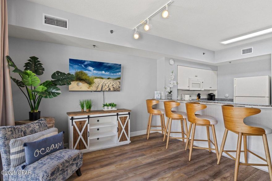 Welcome to Unit 1408 at Shores of Panama -- a coastal retreat offering stunning Gulf views and resort-style living! This beautifully furnished condo features an open floor plan, private balcony overlooking emerald waters, and stylish finishes. Enjoy a lagoon-style pool, hot tubs, indoor pool, fitness center, spa, tiki bars, and beach access. Located next to Pineapple Willy's,  shops, dining, and entertainment. Don't miss your chance to own a slice of paradise -- schedule your showing today!