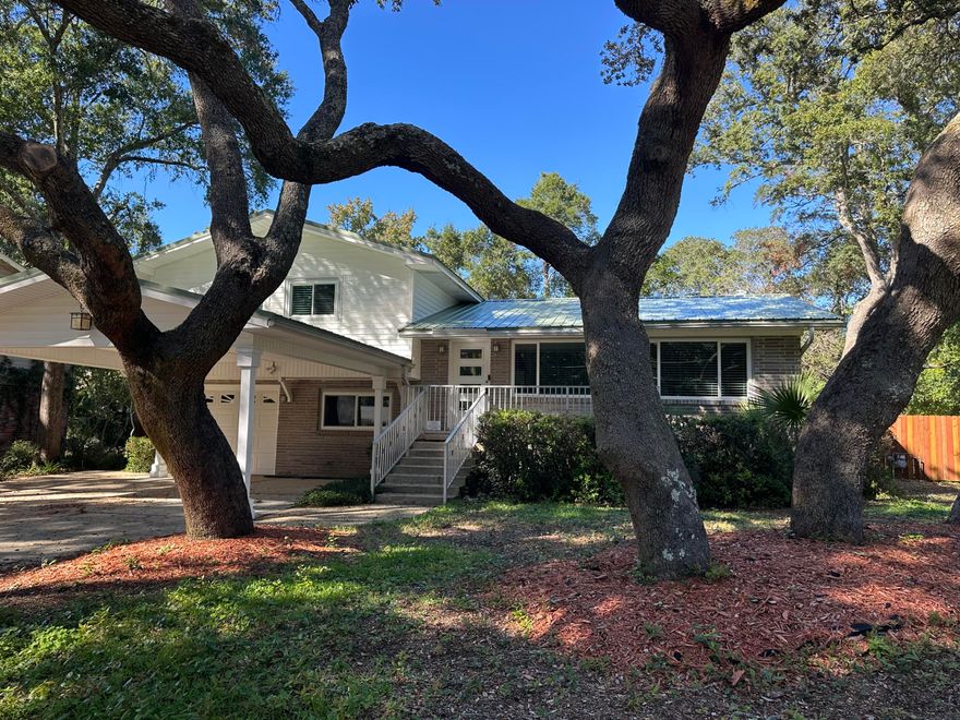 Beautifully updated 6BR/3BA, 2,433 sq ft home in Colony Estates with pool and extensive upgrades from 2020-2025. Features include new thick-gauge metal roof, hurricane-impact windows/doors, new 2025 HVAC system, updated electrical, WiFi thermostats, LED lighting, fresh interior paint, and renovated deck. Pool with salt system and new chlorinator, fenced yard with stained pickets, upgraded garden shed, and new garage door opener. Move-in ready, energy-efficient, and close to bases, schools, and beaches!