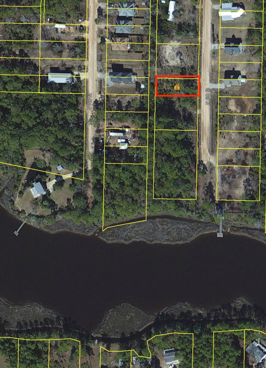 This wooded lot off of N 6th Street is less than 5 miles to the beach and is just a short walk to Cessna landing. This parcel is secluded with light trees and foliage featuring easy access that will make for an excellent home site. The Cessna Landing boat ramp along Hogtown Bayou and near Choctawhatchee Bay offers; 2 launching lanes, courtesy dock, 16 designated boat trailer parking spaces, playground, handball court, picnic pavilion, grills and restrooms.