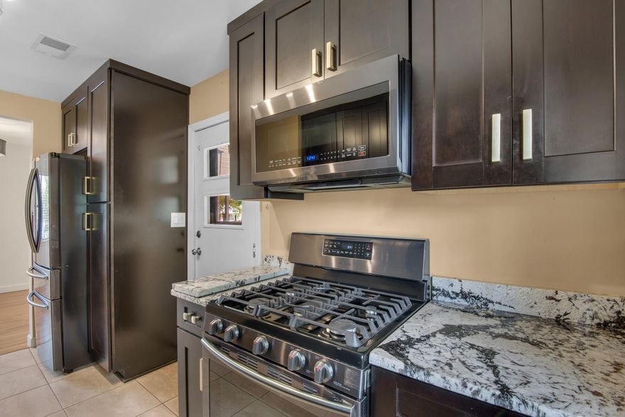 Back on the Market!  New roof, now's your chance. Great buy for either an owner-occupant or a savvy investor! Great location in central Fort Walton Beach near the military bases, shopping, schools, and the beaches. Built in 1955 on a large tree-shaded lot, so there are vintage features like the tongue and groove wood floors and cozy floorplan that you'll enjoy. But there are also some upgrades/replacements that will appeal as well: Car port Roof, kitchen cabinets, range/oven, dishwasher, fridge & microwave - 2018. Tile kitchen floor - 2018.  New Electrical Panel & wiring 2024 & 2018, tankless water heater 2018, Primary bathroom added 2018, HVAC - 2023. The interior has been recently painted. At some point insulated windows replaced the originals, and insulated doors were added.