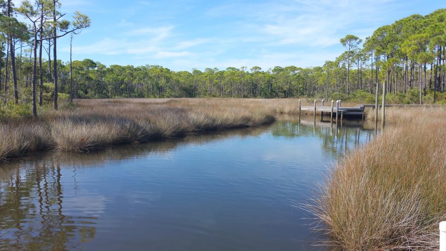 MOTIVATED SELLER HAS REDUCED THE PRICE!!! BETTER HURRY....IT WON'T LAST LONG AT THIS PRICE!!! Your opportunity to own one of the very last waterfront lots in the desirable gated golf course community of Kelly Plantation! Situated at the very end of Stillwater Cove, in the cul-de-sac and on deep water Jones Bayou. Large lot, .92 acres, with large building pad. Dock is already in place!