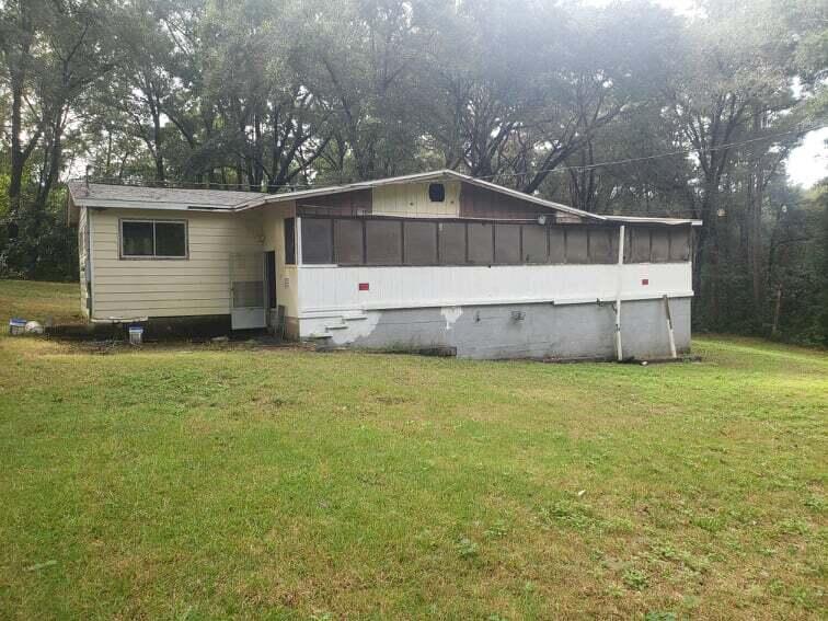 INVESTORS, FLIPPERS SPECIAL! Most of the demo has been done for you, and a new roof installed. So you can get started right away turning this diamond in the rough into something beautiful. It's already been taken down to the studs for easy access to wiring, plumbing etc. This home sits on over 3/4 of an acre lot that slopes downward enough to create a walkout type dirt floor basement or workshop. It features a wrap around porch on 2 sides. The property appraiser site says it's a 3 bedroom 1.5 bath home. In it's down to the stud condition, you can easily change the configuration to make the floor plan flow to however suits you. Endless possibilities at a great price. Per a conversation and email from Crestview Community Development Services GIS Analyst / Planner (850) 682-1560 ext.