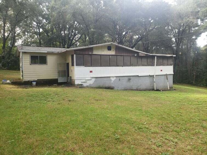 INVESTORS, FLIPPERS SPECIAL!  Most of the demo has been done for you, and a new roof installed. So you can get started right away turning this diamond in the rough into something beautiful.  It's already been taken down to the studs for easy access to wiring, plumbing etc. This home sits on over 3/4 of an acre lot that slopes downward enough to create a walkout type dirt floor basement or workshop.  It features a wrap around porch on 2 sides.  The property appraiser site says it's a 3 bedroom 1.5 bath home.  In it's down to the stud condition, you can easily change the configuration to make the floor plan flow to however suits you.  Endless possibilities at a great price. Per a conversation and email from Crestview Community Development Services GIS Analyst / Planner (850) 682-1560 ext.  203. The minimum lot width per the zoning district is 50', and the existing property is about 190', so you could get 3 lots out of it. Attached in the photos is a Crestview Lot Split Application. Buyer must perform their own Due diligence on all information provided.