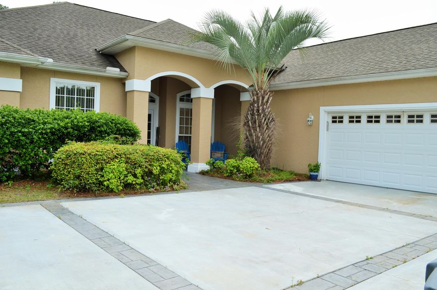 If you are looking for a family home in Panama City Beach with a place to Dock your boat - come and see this 4 bedroom home on the canal in Dolphin Bay neighborhood! This home is on a deep water canal with 90 feet on the water. Enjoy a spacious layout with open floor plan, large master bedroom, family room with gas fireplace, and enclosed sunroom that opens to a patio overlooking the canal. Great entertaining spaces both indoors and outdoors. If you don't need a 4th bedroom, this extra room would also make a great office. This home was just painted on the exterior. Dolphin Bay is a gated community with a marina, and close to the Navy Base, Pier Park, Publix grocery store, shopping, dining, and of course - the beach! Also very close to Hathaway Bridge for easy access to get in town. Call