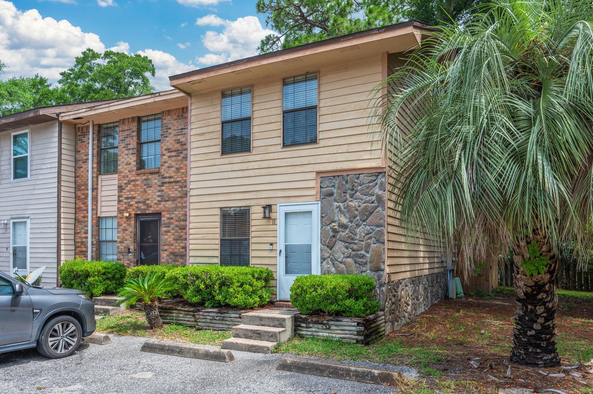 How Cute is this.... Centrally Located 2 Bedroom / 1.5 Bath Townhome w/Screened Porch, Large Indoor Laundry Room and Privacy Fenced Back Yard!! Other Features include: 2020 AC & Heat / 2015 Roof / 2015 Plumbing (Replaced Polybutylene) / Vinyl Wood Look Flooring throughout except Stairway / New Carpet on Stairway / End Unit / Ceiling Fans / Cedar Siding / Storm Door. Small HOA of $167/Qtr maintains the Common Grounds and includes Trash. Conveniently located Close to Shopping & Restaurants, approx 3 miles to Hurlburt Field / 7 miles to Eglin AFB and still only 5 miles to the most Beautiful Beaches on the Emerald Coast and all the FUN this area has to offer! Buyer to Verify all Dimensions and Information.
