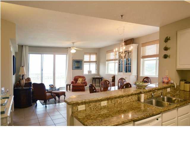If you are looking for a condominium with a view, this is the unit for you! This beautifully appointed three bedroom / three bath condominium has all of the features that you would ever want at the beach...with views from the Gulf to the Bay! Wonderful and spacious Living Area for that family gathering spot. This unit has never been placed on the open rental market...only used by family and close friends. The kitchen features white cabinetry, granite countertops, and GE appliances. The master bedroom has fabulous gulf views and one of the guest bedrooms has views of the bay. The spacious master suite has a large closet with double vanities and a separate shower. The balcony is accessible from the living room and the master bedroom and it offers gorgeous gulf views any time of the