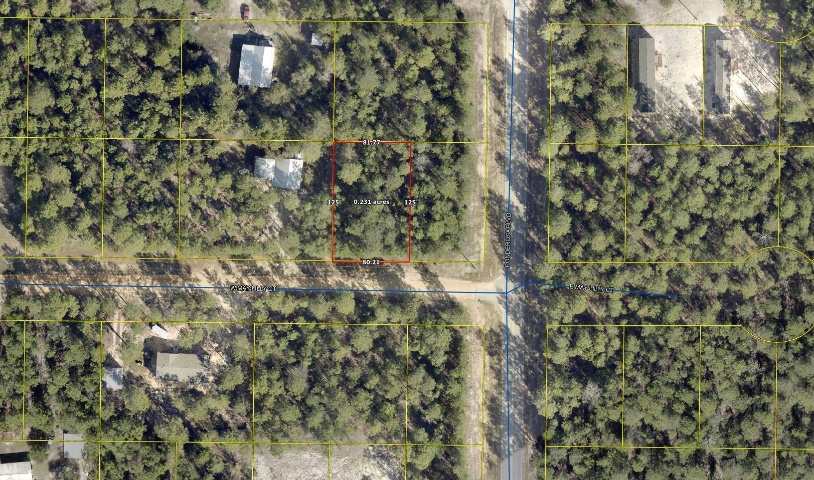 Great near half acre lot in Oakwood Hills at the corner of Ponderosa (paved) and May Lilly Court. Level and wooded so choose the trees you want to keep for privacy. Don't miss out on this one!