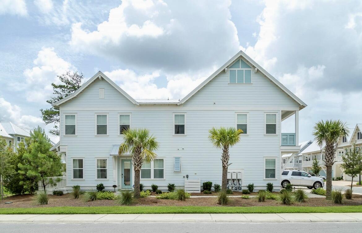 PRICED TO SELL IN PROMINENCE! Highly sought after Corner Lot. Pristine 3 BR 2.5 BA Townhome with ''Bahamas'' floor plan offers an open main floor with living, dining and beautiful chef's kitchen. Light abounds throughout the entire living space. Nearly every aspect of this home is upgraded and has been professionally decorated to include shiplap, built-in wood shelving, quartz countertops, hardwood floors custom window treatments and luxury furnishings. Upstairs is the master suite with dual vanity, walk-in shower, and large walk-in closet. A two-car garage accommodates your parking needs and storage for beach toys. Landscaping along the back deck provides additional privacy. Resort Style Community Pool and Fitness Room ready for your enjoyment. All furniture and interiors convey.