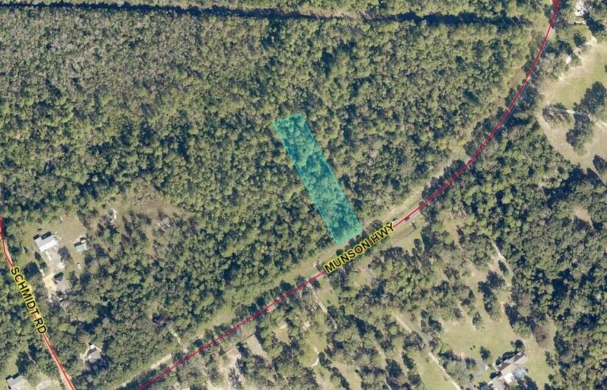One acre lot on Munson Hwy zoned AG-RR. Zoning allows for ONE  manufactured, modular, SFR, and / or mobile home. RV's ARE allowed as well. Survey available. Septic needed. Electric and water on frontage of Highway. Buyer will need to pay tap fee. Carpenters Park on Broad Street, it is 1.5 miles and takes 3 mins