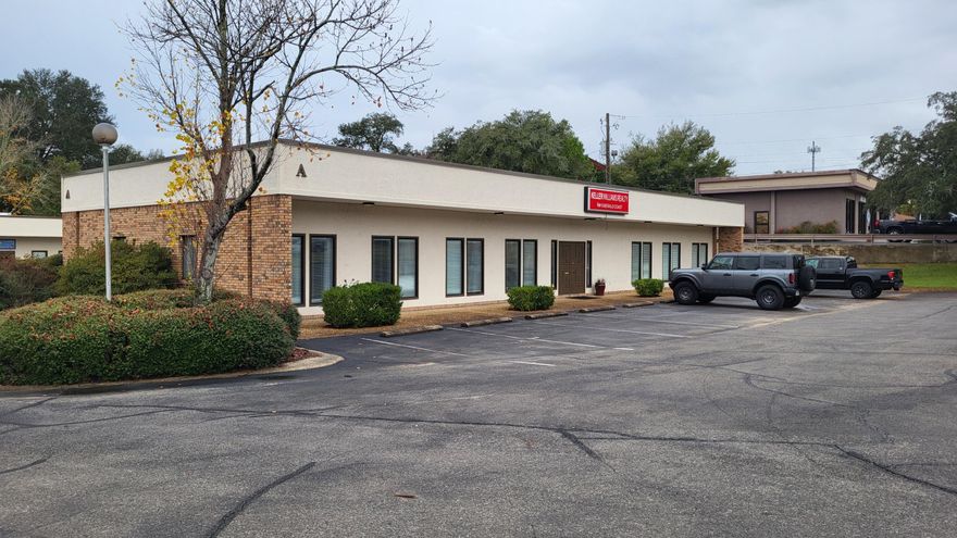 Freestanding building with 11 offices, reception, break room, 3 restrooms.