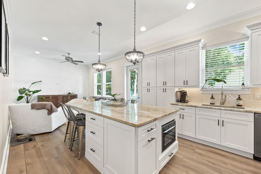 New custom built home in Blue Mountain Beach one of the highest elevations on 30A.  Enjoy the 30A lifestyle just a short walk to the beach.  This  3 level home has a  separate apartment on the 3rd floor with private entry, kitchen , living room, bedroom, bath, laundry, and large front porch.  You could use the home as a single family or for great income potential rent as two separate units.  Home was built with 6'' exterior walls with spray foam insulation in exterior walls, ceilings, and under the first floor, with impact glass and a metal roof you are well protected from the elements.  This beautiful home features granite and quartz counters, slate appliances, tiled backsplashes, ship lapped accent walls, barndoors, soft close cabinetry, custom staircase, plenty of storage. see more