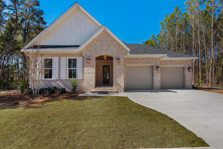 Hammock Bay's newest community - Reflection at Hammock Bay.  Featuring a gated entrance, easy access over to the Bay Club, oversized preserve lots, some backing to Bear Creek and ponds - it's a limited opportunity to say the least.  The Addie plan by locally renowned builder features 3 bedrooms and an office on one floor.  This luxury home features wood floors throughout, fireplace, Cambria quartz counter tops, furniture grade Woodharbor cabinets, gas cooktop, cabinets to the ceiling in the kitchen, farmhouse sink, custom tile work, and a refrigerator, built in oven and convection microwave.  Oversized rear covered porch to enjoy the fantastic back yard.  Rear yard will feature treed buffer with natural landscape plus sod and sprinkler