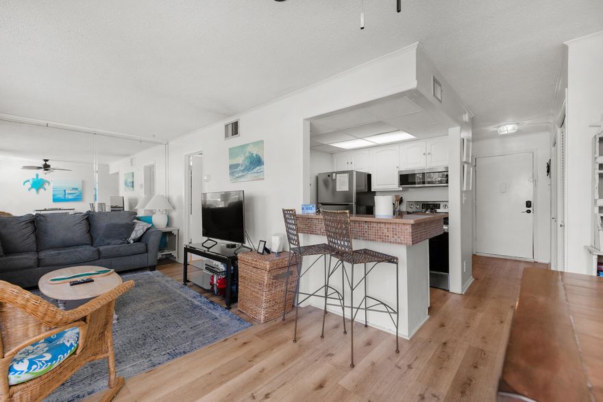 Welcome to your perfect coastal retreat! This beautifully updated condo in Sandpiper Cove offers a fresh, beachy vibe on Holiday Isle. Enjoy easy access to the beach, canals, 2 restaurants, golfing, pickleball, tennis, shuffleboard and so much more, all in the comforts of a modern, stylish unit.Step inside to find a light-filled, open-concept living area adorned with coastal-inspired decor and contemporary finishes. The living room, featuring plush furnishings and a flat-screen TV, is perfect for unwinding after a day in the sun. If you enjoy cooking, the kitchen will delight you. With quartz counters and 4 yr old appliances plus fully equipped cabinets, you'll be cooking up melas with ease. This unit is also equipped with a wash and dryer! The bedroom is a serene oasis, offering a cozy retreat with ample storage and a tranquil atmosphere. The updated bathroom boasts elegant fixtures and a spa-like feel, ensuring you have a relaxing space to refresh and rejuvenate. No carpet here so you don't have to worry about tracking in all that beautiful Emerald Coast sand. 
Outside, enjoy the convenience of a private deck where you can sip your morning coffee and soak in the serene surroundings. As a resident of Sandpiper Cove, you'll have access to fantastic community amenities including pools, tennis courts, and boat docks, enhancing your vacation experience.
Whether you're looking for a personal escape or a lucrative rental investment, this condo offers both charm and practicality in the heart of Destin. Embrace the laid-back lifestyle and make this delightful condo your new getaway!
Important info to note: HVAC installed in 2019, water heater installed in 2022, dishwasher and garbage disposal installed in 2021, LVP installed throughout in 2020, and an upgraded larger washer was installed in 2022. 
This unit consistently gets great gross rental numbers: in 2023 the unit grossed $34k with 9 days of personal use during peak season. In 2024 as of 8/27 the unit has grossed $26 k with 7 days of personal use during.
