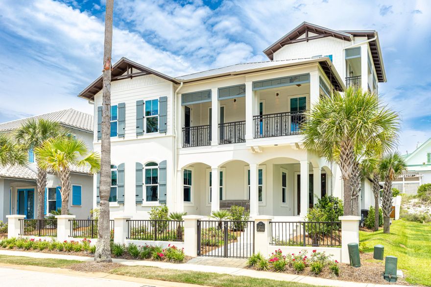 Your Caribbean-Inspired Oasis Awaits in Guard-Gated Caribe!In less than two minutes, you could be unwinding on Caribe's quiet, sugar-white beaches--your beach chair already set up, the waves just steps away. Nestled just 400 feet from 500 feet of neighborhood shoreline, this 2022-built coastal retreat was thoughtfully designed by DC Architects and masterfully constructed by Dennis Childers.Step through welcoming glass front doors into interiors curated by Julie Liebetreu, where neutral tones, plush designer furnishings (included in the sale), and layered textures create an atmosphere of refined comfort. Stone tile flooring soothes underfoot, while interior brick accents, exposed wood beams, and statement lighting offer understated luxury. The open-concept first floor is perfect for gatherings or quiet evenings by the gas fireplace. A chef's dream, the kitchen features custom floor-to-ceiling cabinetry, a large pantry, copper-accented hood, Viking range with griddle, Sub-Zero appliances, and even a crushed ice maker for ultimate refreshment. A central island offers storage, a microwave drawer, and seating for four.

Downstairs also boasts a sumptuous primary suite, complete with serene linens, muted rugs, and wood accents. The ensuite bath includes a soaking tub, dual vanities, and floor-to-ceiling tile. French doors lead to a private, walled backyard with astroturf for easy maintenance and a fully equipped outdoor kitchenideal for al fresco dining with a 6-burner grill, vent hood, sink, and refrigeration.

Upstairs, guests will find three spacious bedroomsone ensuite and two sharing a Jack-and-Jill bathall tied together with soothing blues, wood floors, and access to a balcony with Gulf views. A five-seat home theater sets the scene for cozy movie nights.

Ascend to the third floorby stairs or elevatorfor a sunset-viewing lounge with panoramic Gulf views and an outdoor balcony, perfect for evening cocktails.

This home also includes a rear-entry 2-car garage, plus a full-house  generator, a spacious laundry room, and powder room with stunning tile accents.

Located in Caribe, a gated gulf-front community in Miramar Beach, residents enjoy access to two community pools, tennis courts, and over 500 feet of private beach. Short-term rentals are permitted with restrictions, making this a rare opportunity for both serene living and investment potential.
Come home to tranquility, style, and sand-between-your-toes simplicity. Welcome to Caribe.