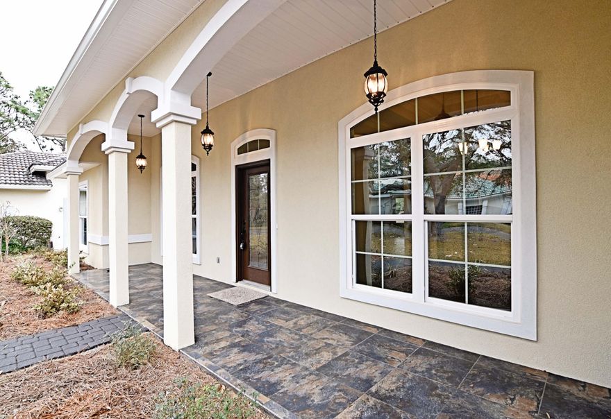 72 hour First Right of Refusal Contract in place. Contingent on buyers' home selling. NEWLY CONSTRUCTED, Lakefront, 4bed/2.5bath, 2800 sq/ft with golf course views in the lovely gated community of Sunset Beach in Bluewater Bay. Only a couple of blocks from the Bay! Home sports slate-tile roof, grey paver-stone drive/walkway, and large covered front entrance with 3 beautiful chandeliers. Home is accented with arched walk-thrus, bull-nosed corners, 12' ceilings, 8' doors, thick-detailed baseboards, and 7'' crown (in all main living areas & Master). Walls, finishes & fixtures are in a neutral shade and welcome any owners design aesthetic. Beautiful double-tray ceilings are found in both the dining and family rooms.