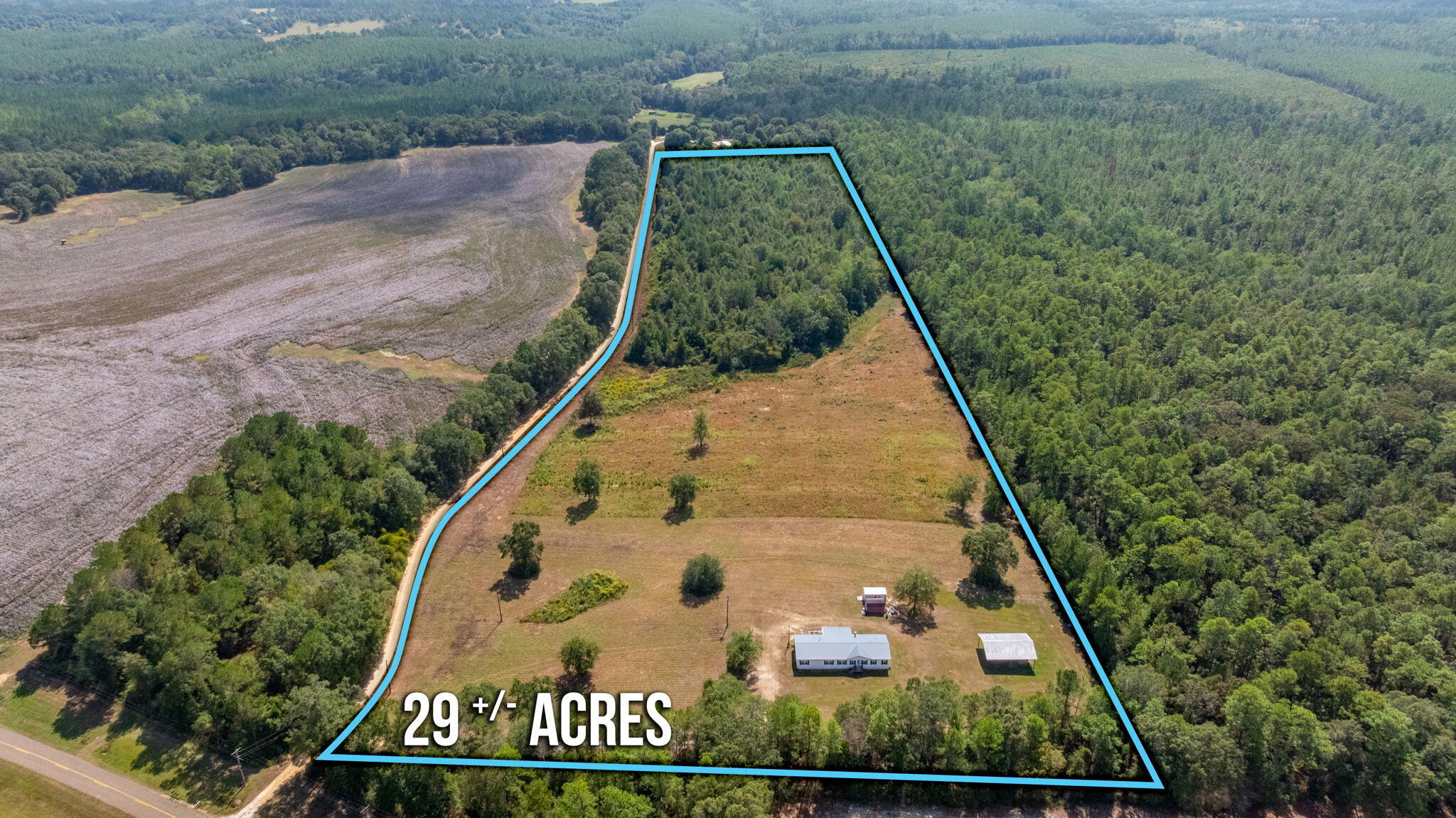Discover the quiet charm of Covington County with this spacious 2006 mobile home offering 2,560 square feet of living space on 29 acres in Wing. Featuring 4 bedrooms and 2 bathrooms with open living areas, the property provides room to relax, gather, and enjoy the surrounding countryside. The land offers plenty of potential for gardens, outdoor hobbies, or simply taking in the peaceful setting. Located in an unincorporated area, the property blends rural living with convenient access to Andalusia, Florala, and nearby lakes, parks, and outdoor recreation. Enjoy a peaceful lifestyle surrounded by natural beauty while remaining a short drive from shopping, dining, and local conveniences. 30x40 Pole Barn, 12x25 Covered Deck, 12x12 Open Deck. Schedule your showing today!