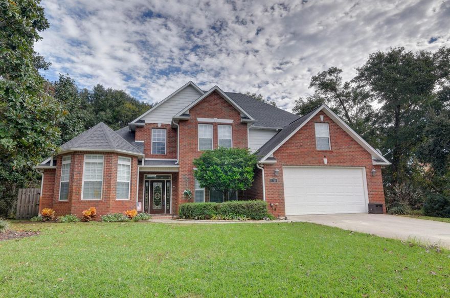 Pensacola Parade of Homes Winner in 2002. This Beautiful Custom-Built Home is a must see! You can see the pride of ownership in this one-owner home. This home offers 5 bedrooms and 3 bathrooms, and is located in the water-front community of Magnolia Harbor with deeded access to the Santa Rosa Sound. The Large Kitchen has custom cherry cabinets, granite counter tops & stainless steel appliances. The formal dining room has beautiful wood flooring. The large great room has high ceilings and tiled floors, great for entertaining. The master suite, second bedroom and utility room are all downstairs. The master suite features: a sitting area, trey ceiling and 2 closets, one is a walk-in closet. The master bathroom has