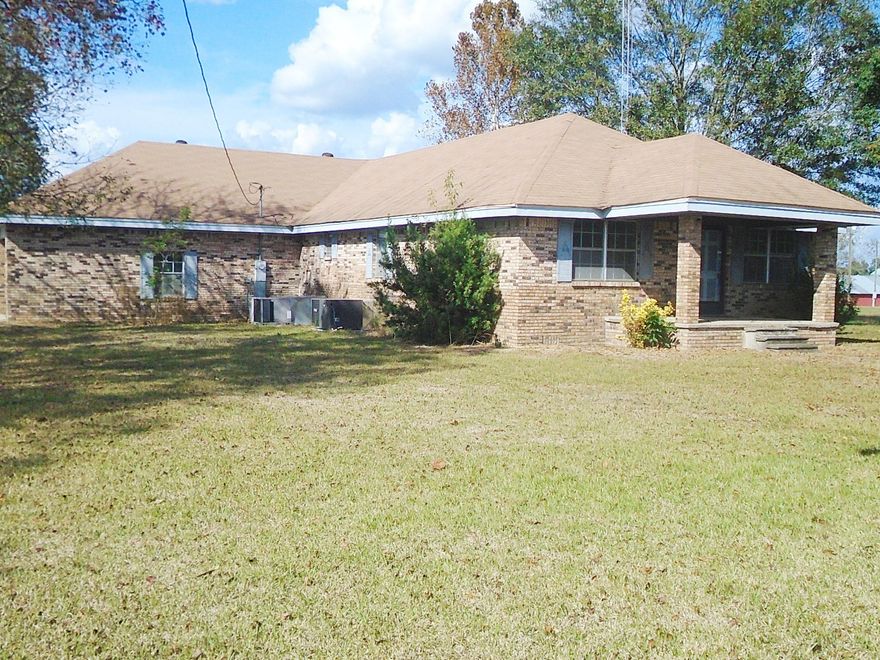 THIS HOME LOCATED IN THE COUNTRY HAS ALL THE THINGS YOU NEED TO ENJOY COUNTRY LIVING. THIS BRICK HOME CONSIST OF 3 BR, 2 BA, A KITCHEN WITH TONS OF CABINETS AND A AMAZING PANTRY, A LARGE OPEN LIVING ROOM, ADDITIONAL FAMILY ROOM WITH FIREPLACE, A ENOURMOUS BONUS ROOM, AND A HOME OFFICE LOCATED OFF THE 2 CAR COVERED CARPORT. HOME HAS TONS OF SPACE AND COULD MAKE A PERFECT HOME FOR YOUR FAMILY. HAS BEEN WELL MAINTAINED AND WITH SOME COSMETIC UPGRADES THIS COULD BE YOUR PERFECT COUNTRY PARADISE. PROPERTY IS 2.66 ACRES AND INCLUDES A 57X42 AND 45X30 BARN AS 2 WELLS ON THE PROPERTY. MAKE THIS HOME!