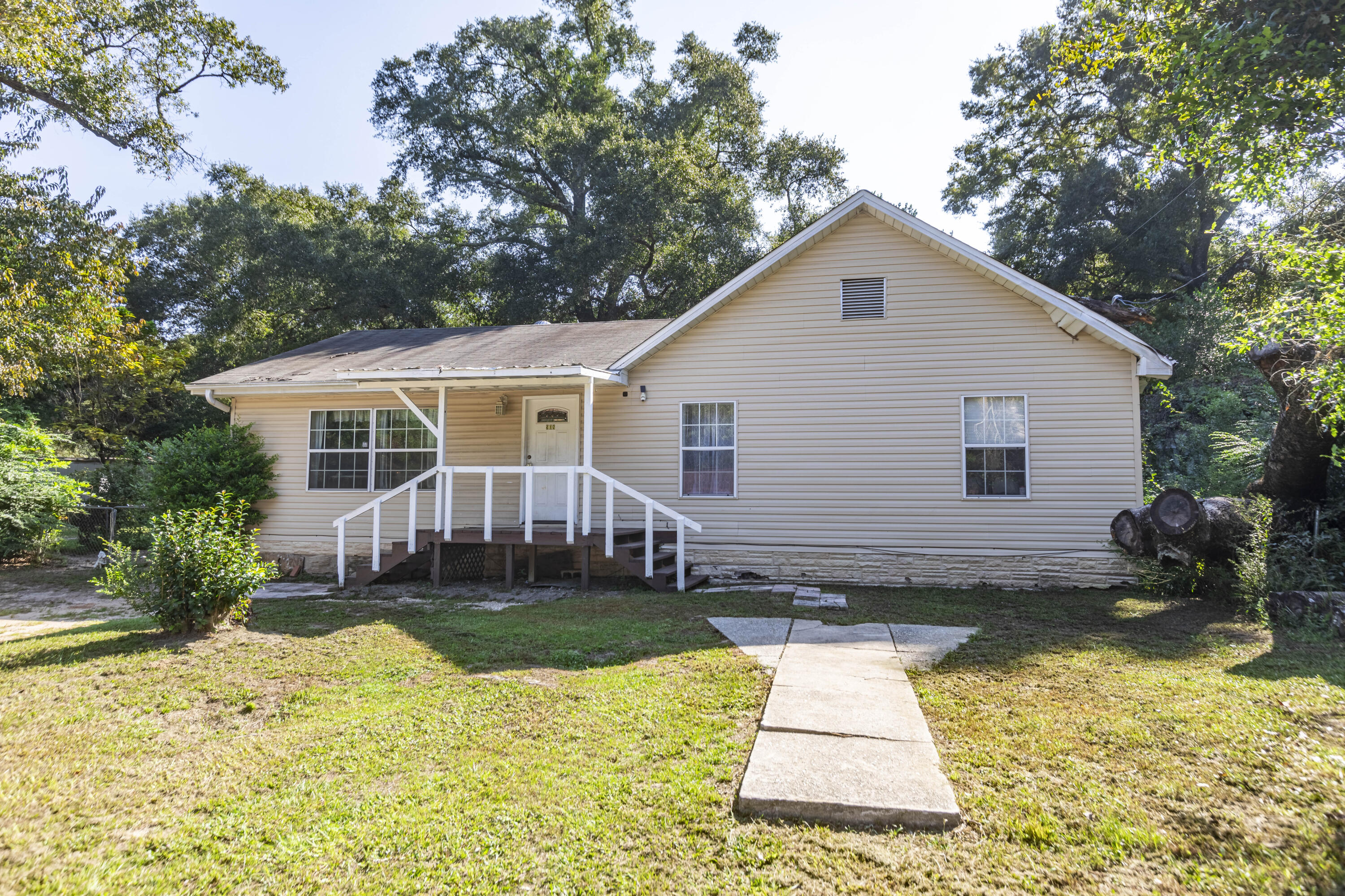 This charming 3 bedroom home is loaded with lots of character. This home features nice sized bedrooms, oversized living room and dining room, and indoor laundry room off the kitchen. It will make a great starter home, 2nd/vacation home, investment property. **All measurements are approximate, buyer to verify if important**