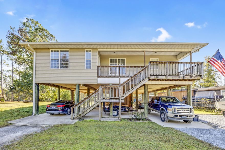 Seller to contribute up to $10,000 towards closing cost, prepaids/escrow or rate buy down.  Don't miss out owning this piece of paradise. This beautiful updated home is located on Alaqua Creek. The home has 3 bedrooms, 2 baths, 2 living rooms, and a spacious kitchen.  When you walk through the front door you will notice the large living room with hard wood floors from there you will enter the open kitchen with granite countertops and sitting area for those delicious meals. Off to your left you have a large laundry room with decorative shelving. Next is your hallway that takes you to the two secondary bedrooms and full bathroom.To your right is the smaller living room with access to the large outside covered deck with the beautiful view of the Alaqua Creek. The large master bathroom consist of garden tub, shower and large walk-in closet. The backyard has a dock & launch area for kayaks & canoes, cleaning station, brick BBQ pit, fire pit, ready for your enjoyment and let's not forget the large storage room underneath the home. Do not miss out on this beautiful home.  Schedule your appointment today!