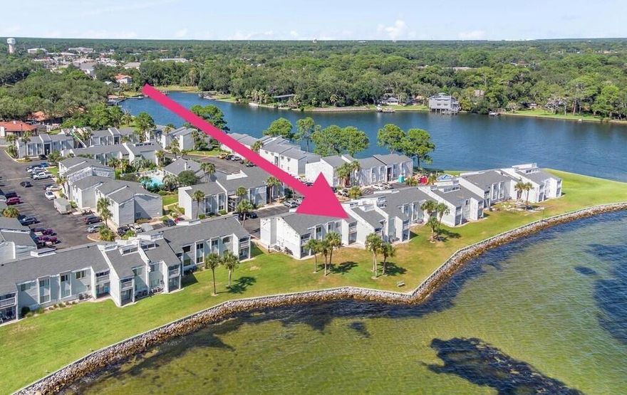 Don't miss out on this incredible opportunity to own a second-floor direct waterfront condo within the prestigious Finisterra Condos. Wake up to breathtaking views of the tranquil water, where you can observe playful dolphins and various watercraft passing by during peaceful mornings. This spacious condo boasts two bedrooms, making it the perfect residence or ideal second home.The community offers an array of fantastic amenities, including a sparkling swimming pool, tennis courts, a convenient laundry facility, gated access, inviting waterfront sitting areas, outdoor grills, and more, ensuring a truly enjoyable lifestyle.Additionally, the complex is a non-rental community for the first two years of ownership, providing a sense of exclusivity and privacy. However, once the two