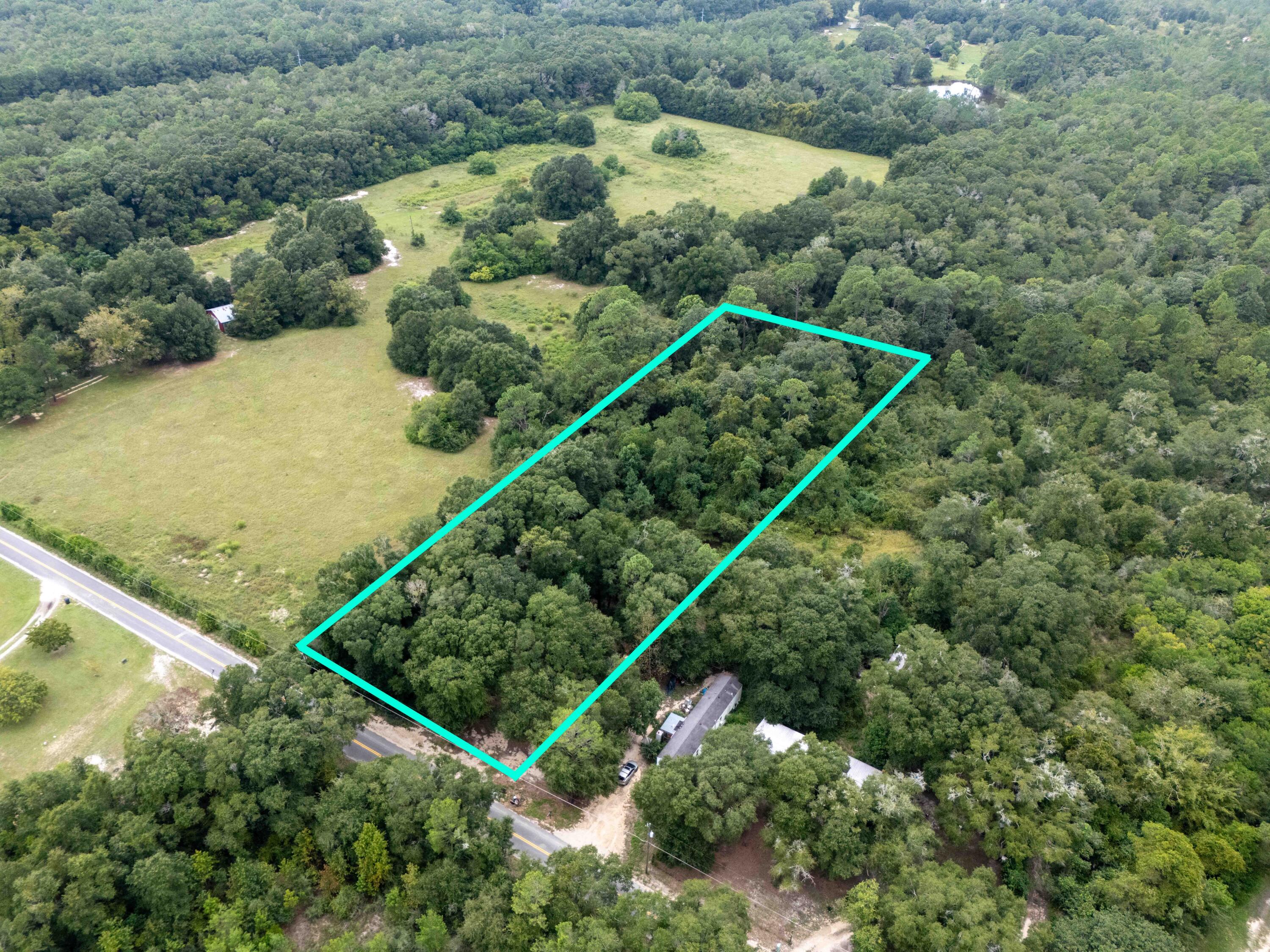 Can you get 2 full acres for $37,500 just 5 minutes from downtown DeFuniak Springs? Yes, it's true! This property is located just outside the city limits and welcomes your new build or your manufactured home. The front is mostly flat with a gentle fall to the rear of the lot - this could make for some really lovely views with a little extra clearing. Buy now and hold for investment as this part of the world continues to grow.