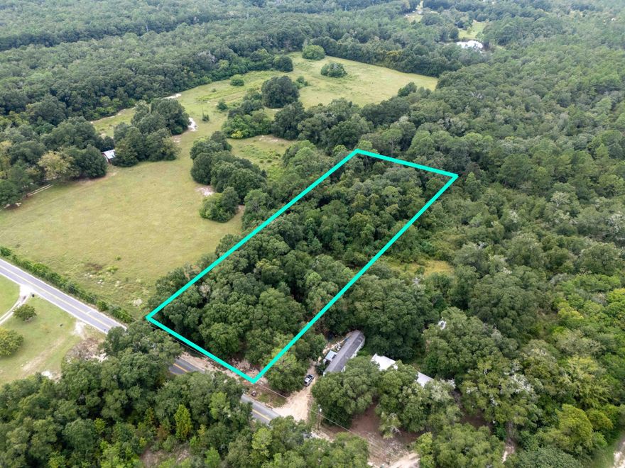 Can you get 2 full acres for $37,500 just 5 minutes from downtown DeFuniak Springs? Yes, it's true! This property is located just outside the city limits and welcomes your new build or your manufactured home.  The front is mostly flat with a gentle fall to the rear of the lot - this could make for some really lovely views with a little extra clearing. Buy now and hold for investment as this part of the world continues to grow.