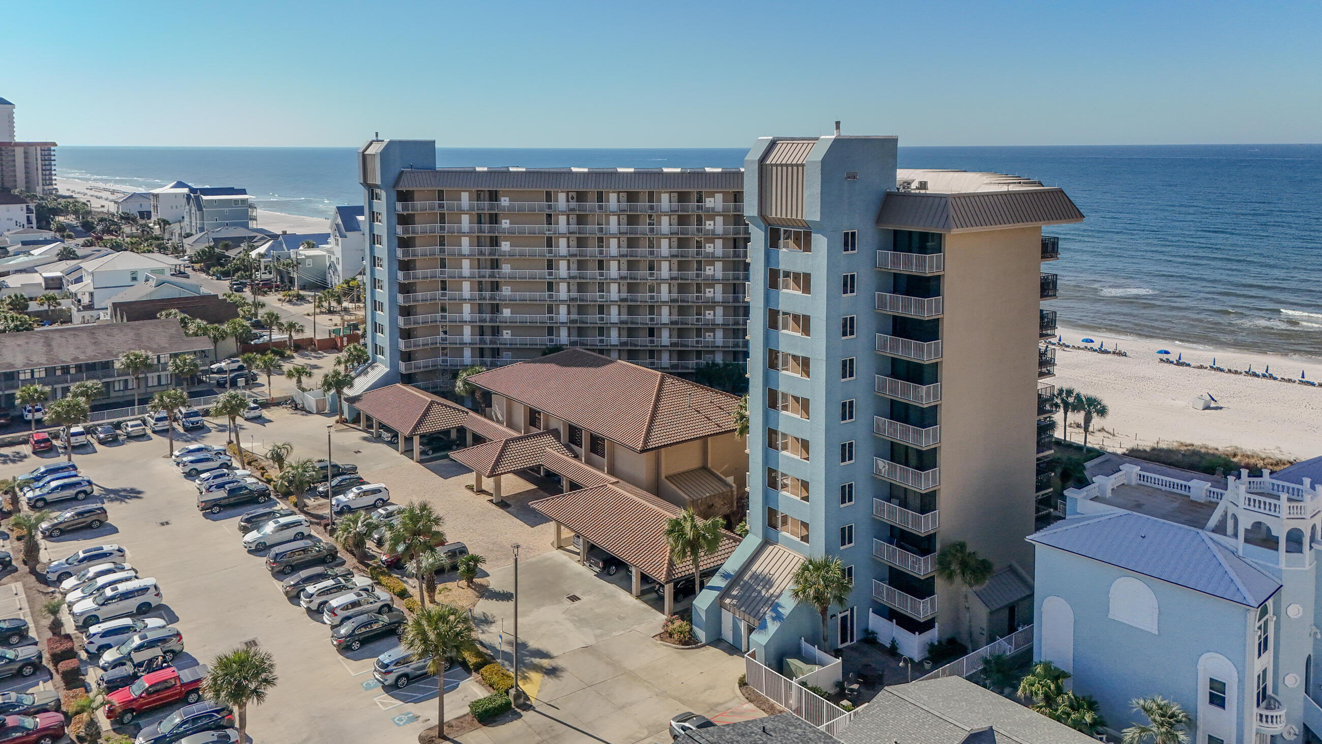 Absolutely Breathtaking Gulf-Front Condo at Pelican Walk - Sold Furnished! This is the one you've been waiting for--the most stunning condo to hit the market at Pelican Walk. A west-facing unit with unobstructed views of the Gulf of Mexico, sugar-white sands, and dazzling sunsets, this third-floor condo offers the perfect blend of luxury, comfort, and coastal charm. From floor to ceiling, every inch of this non-rental unit has been meticulously updated with high-end finishes, ensuring a pristine, like-new condition with zero wear and tear. Beautifully decorated, the interior features hardwood and tile flooring (no carpet), large crown molding, and vibrant artwork, many signed and numbered, all in custom frames. The spotless kitchen boasts granite counter-tops, a porcelain farmhouse sink, custom cabinetry, a spacious pantry making it both stylish and functional. The primary suite is a true retreat, featuring a top-of-the-line I-Comfort King mattress and a spa-like bathroom with a tiled shower and glass doors. A front-loading washer and dryer add convenience. This condo is sold fully furnished, including spectacular artwork, making it completely move-in or rental-ready. Step onto the private balcony overlooking the heated Gulf-front pool and the emerald-green waters of the Gulf, and enjoy breathtaking views. Located on the third floor, you have the option to take the stairs or the newly updated elevators for quick access. Looking for storage? A utility closet right outside your front door provides the perfect space for all your beach chairs and toys. Resort-Style Amenities at Pelican Walk Include: - Two Gulf-front pools (one heated) - Sauna and hot tub - Racquetball court, shuffleboard, and pickle-ball/tennis courts - Pet walk and lush landscaping with a central fountain - Two large, well-appointed grilling areas - Spacious community room for gatherings Located in one of the most desirable resorts on Panama City Beach, Pelican Walk offers a quiet, Gulf-front experience while being just minutes from the area's top attractions: - Close to restaurants, shopping, and nightlife - A few miles from Pier Park - Easy access to entertainment and outdoor activities When we say there's nothing to do but bring your flip-flops and sunscreen, we mean it. Whether you're looking for a dream second home or an investment with excellent rental potential, this condo is a rare find. Come tour today!