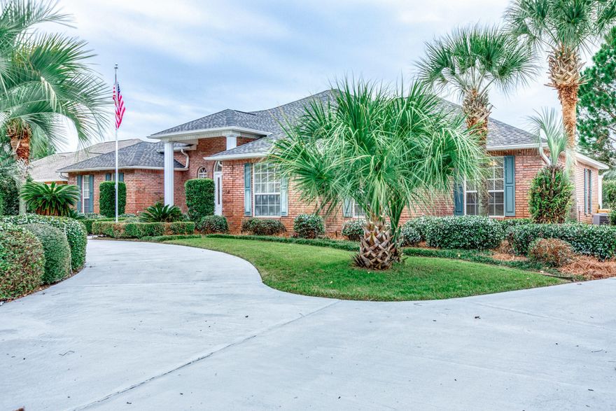 A tropical oasis located in one of the most desirable golf course communities in Destin! The screened pool surrounded by palm trees and tropical plants provides a secluded retreat you will never want to leave. The spacious 2500 sq ft home has a split floor plan with 11 foot ceilings, crown molding, tray ceilings, & gas fireplace. Light colored wood floors are in all living areas and bedrooms. Decorative columns enhance the home and pool area. The formal dining room can also be used as a home office. The oversized garage has workbench, cabinetry, and utility sink. The roof, screen pool enclosure, and AC compressor were all replaced in 2018. Located on a quiet cul de sac with no thru traffic. Refrigerator, washer and dryer convey. View this home before it's sold.