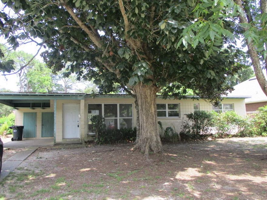 You won't want to miss this REO home located in the heart of Fort Walton Beach. This home large enough to accommodate smaller families and comes with 4 bedrooms and 2 and 1/2 baths. Home has block exterior, fenced back yard and covered carport. Inside, you will find tile, and carpet throughout, and with a little updating this could be a great home for this location. This one certainly will not last long and is a must see to appreciate! This home is FHA financeable with Escrows (IE) of $5800.