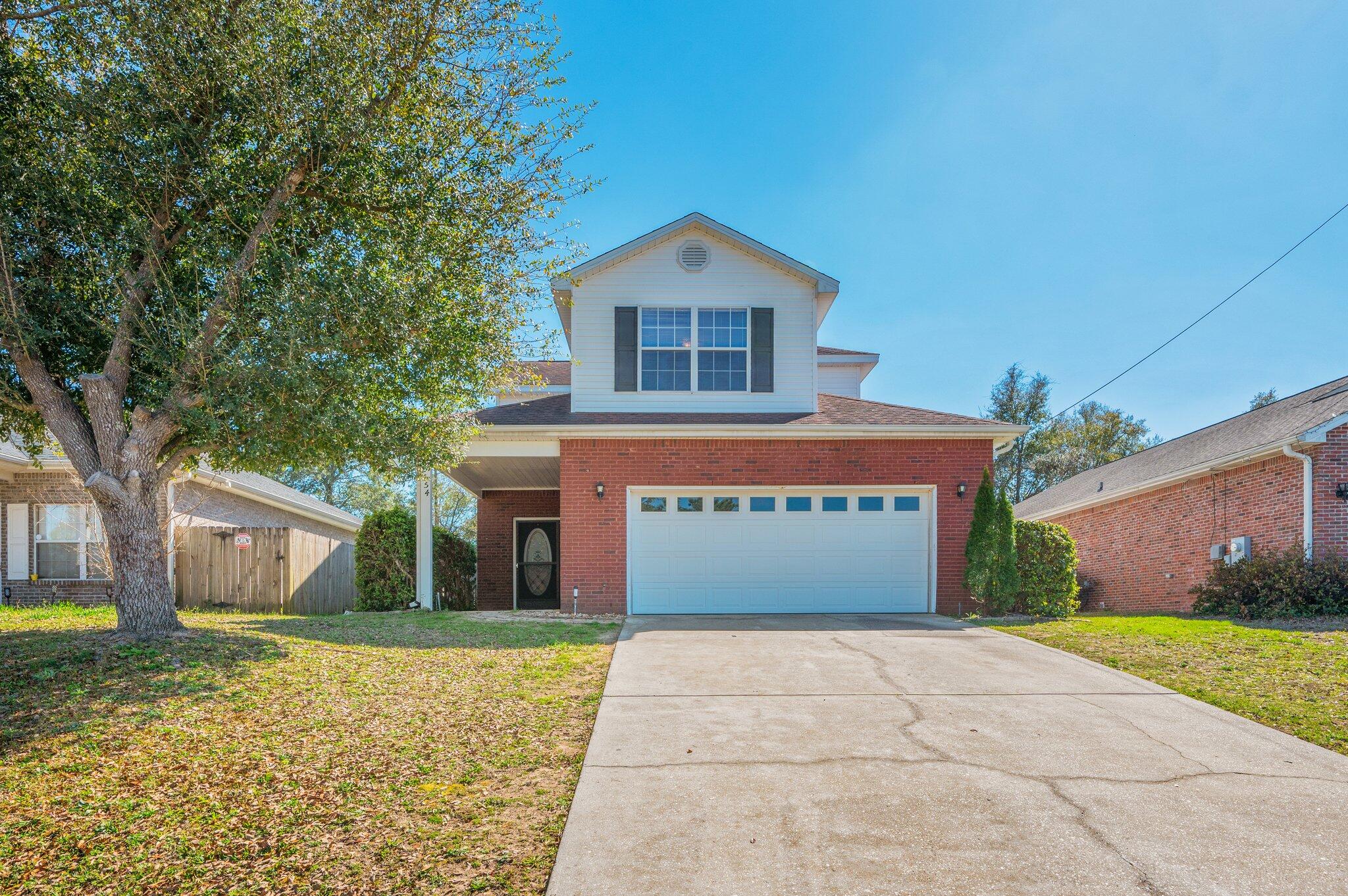 UNDER CONTRACT- ACCEPTING BACKUP OFFERS. Escape the hustle and bustle and enjoy the peaceful charm of North Crestview! This spacious lot and 2-story home offer a quiet retreat while still being conveniently close to I-10, Duke Field, and Eglin AFB. Featuring an assumable VA loan at an incredible 2.375% interest rate with a low monthly payment, this is an opportunity you won't want to miss! The home boasts a well-designed split-bedroom floor plan, a spacious kitchen with ample storage, and a large primary suite, and private baths in all rooms. The fully fenced backyard provides plenty of space for pets, kids, and outdoor fun--even a chicken coop. Extended driveway, 2-car garage, and no HOA, room to park, play, and personalize your space.