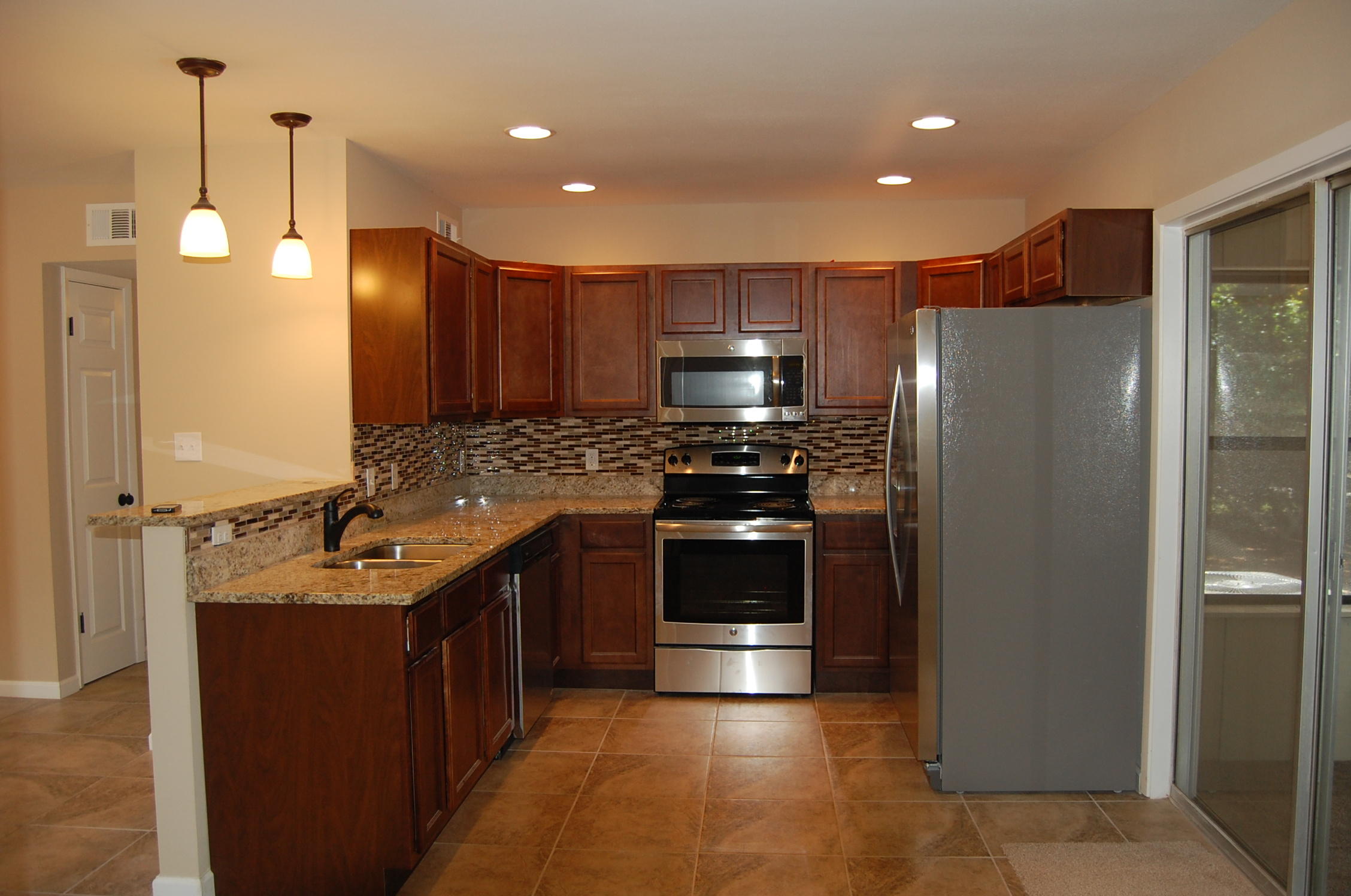 Beautiful & Like New Home! Completely renovated & updated! *** SELLER ALLOWANCE OF $1500 FOR LANDSCAPING PLUS A $500 ALLOWANCE FOR WINDOW BLINDS *** Home is situated on an oversized corner lot of a tree lined cul-de-sac. Spotless & move-in-ready. New 3D architectural roof; New electrical & plumbing. Brand new kitchen with granite counter tops, stainless steel appliances, tile backsplash & under cabinet lighting. 2 1/2 new bathrooms featuring tile showers & bronzed fixtures. New flooring, doors & paint throughout. 4th bedroom can be an office or additional living area Spacious Florida Room and fenced in yard. In close proximity to the south gate of Eglin AFB. A great opportunity to buy a ''Like New'' home at an affordable price in a GREAT area. A MUST SEE !!