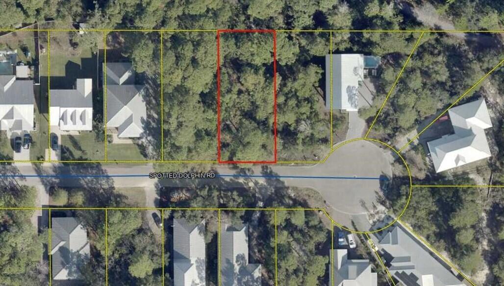 Beautiful wooded lot on the West end of 30a.  Spotted Dolphin is a quiet tree lined one street neighborhood with close proximity to several beach access points and Butler Elementary.  This lot would be a wonderful home site for full time, secondary or vacation home.