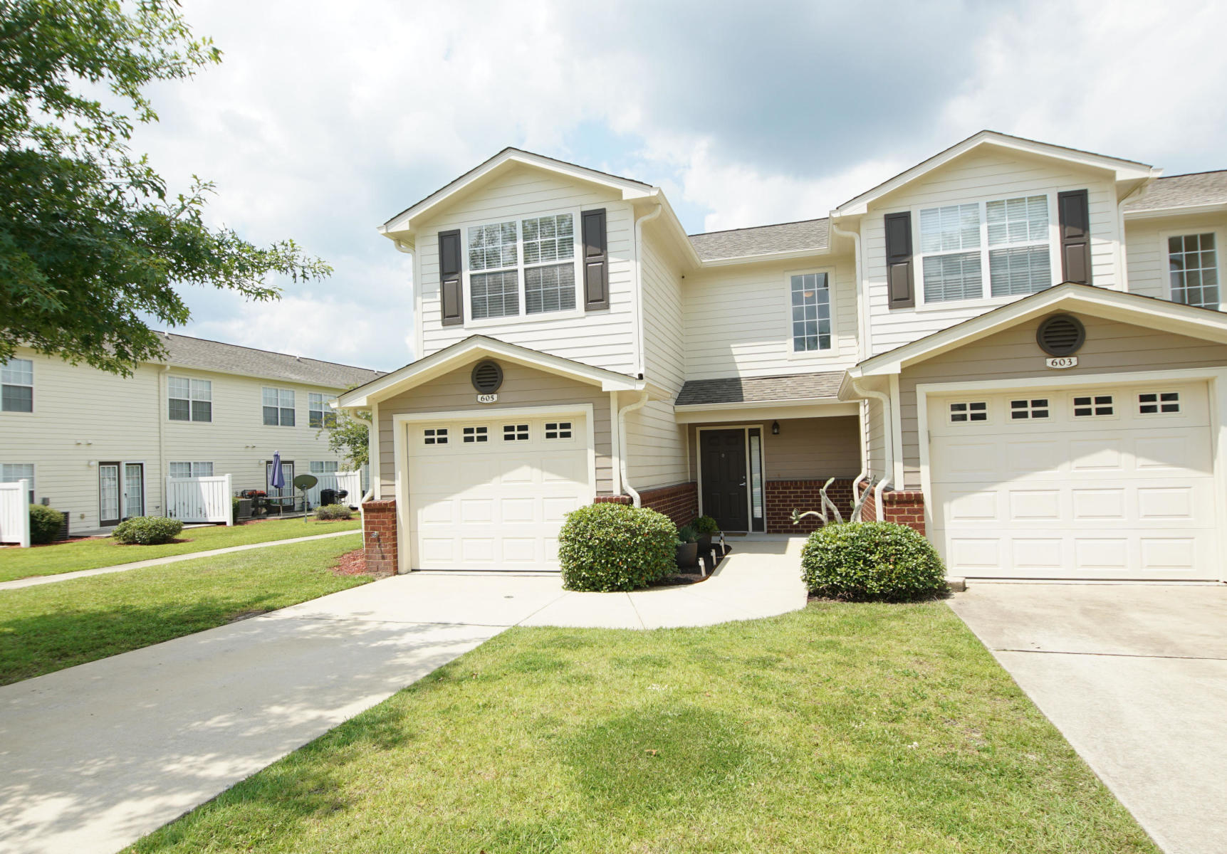 Motivated Seller - Time to move on....Well kept and conveniently located townhome in Crestview's best townhome community! Features include 3 bedrooms and 2.5 baths with wood-grain tile throughout the ground floor living and common areas - galley kitchen with 1 year old dishwasher - ample living room with dining area - laundry/half bath combination on the ground floor for convenience - 3 roomy bedrooms on the 2nd floor for privacy - one car garage - back patio with greenspace and community pool views. AC unit replaced in 2022 and new garage door opener in 2023. Don't miss out on this end unit townhome in sought after Eagle's Landing conveniently located in Crestview's south end!